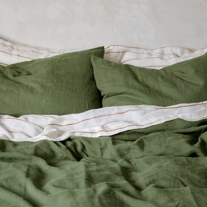 A bed dressed in Forest and Cedar bed linen. Available in Double, King, Super King.