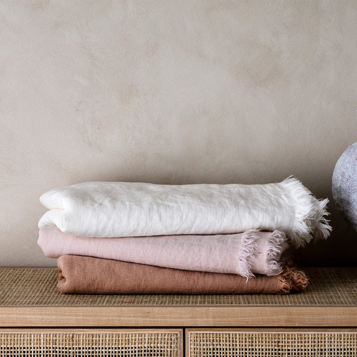  Stack of Freya Linen Throws in Snow, Blush and Fawn