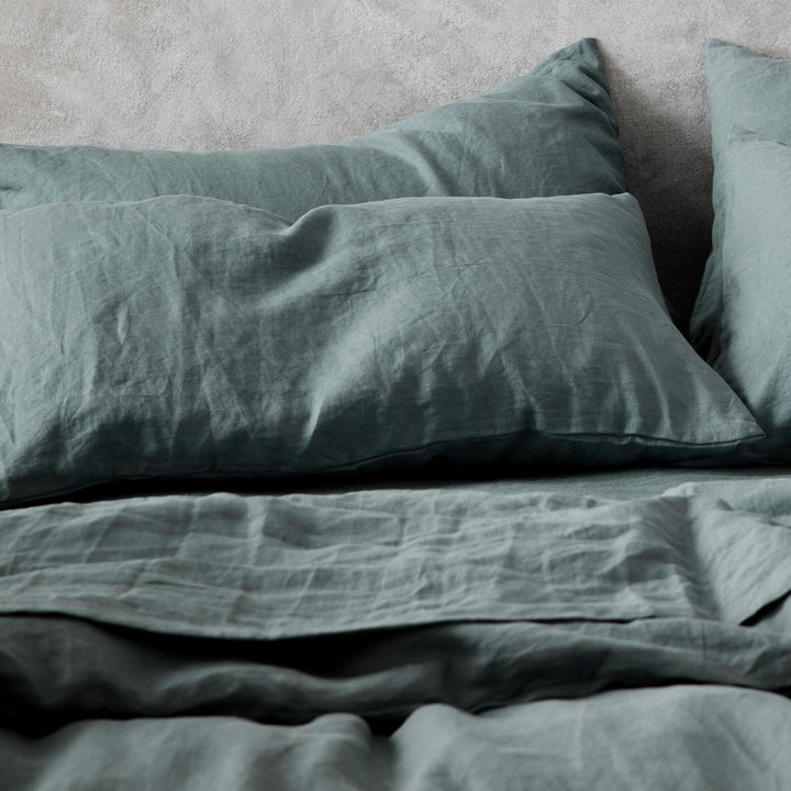 Close up of Set of 2 Linen Pillowcases, a Duvet Cover Set and Sheet Set in Bluestone. Available in Standard & King.