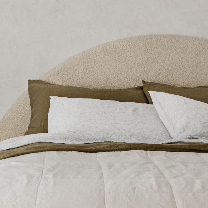  A cream bed dressed in Olive, Pinstripe and Natural bed linen. Available in Single, Double, King, Super King.