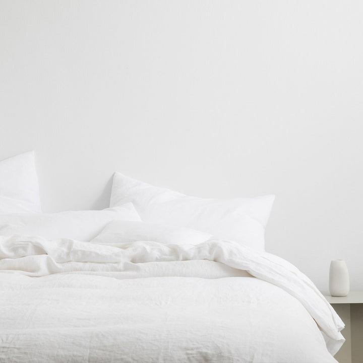 A bed dressed in White bedlinen. Available in Double, King, Super King.