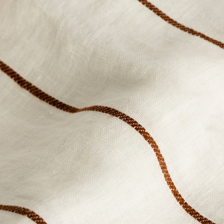 A close up of Cedar Stripe linen fabric. Available in Double, King, Super King.